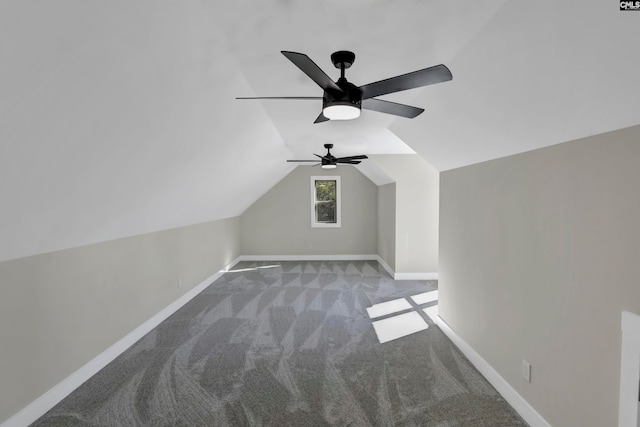 additional living space with vaulted ceiling, ceiling fan, and carpet floors