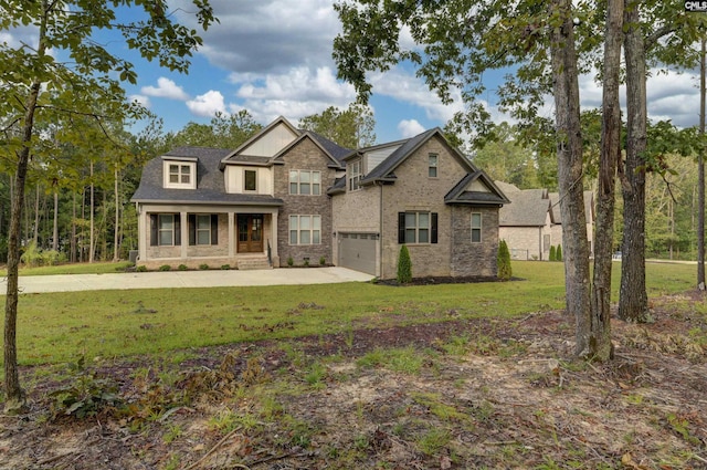 craftsman house featuring a front lawn and a garage