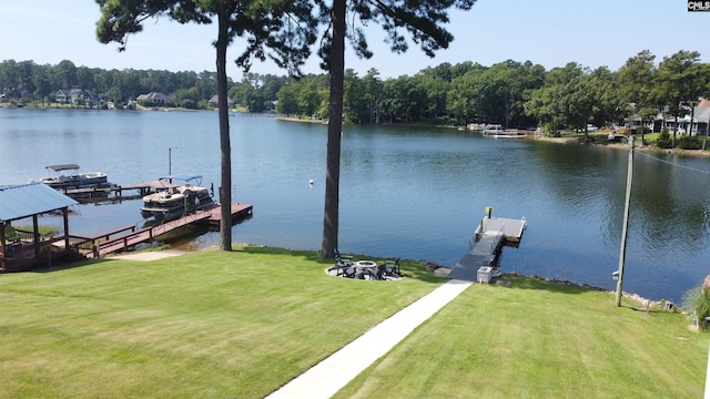 dock area featuring a yard and a water view