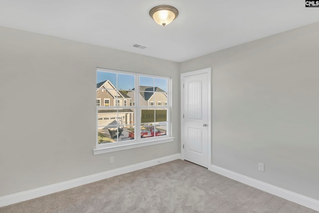 empty room featuring carpet floors