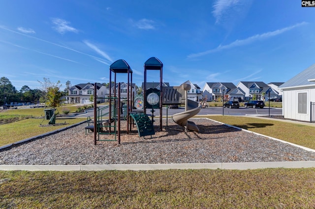 view of playground featuring a lawn