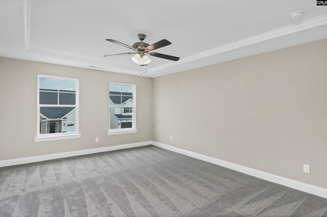 spare room with carpet flooring and ceiling fan