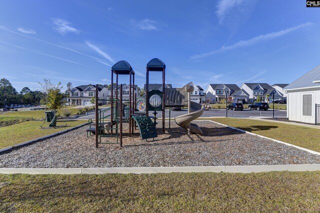 view of playground with a yard