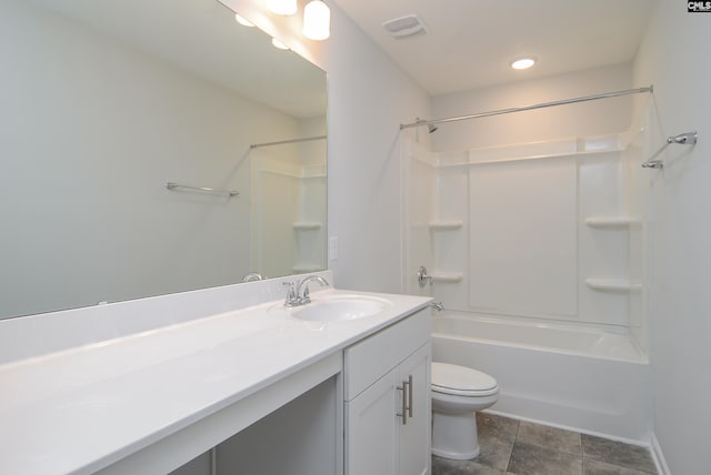 full bathroom with vanity, tub / shower combination, and toilet