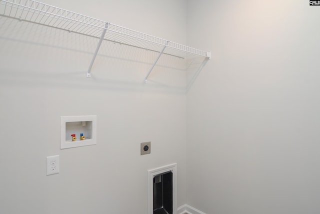 laundry room featuring electric dryer hookup and washer hookup