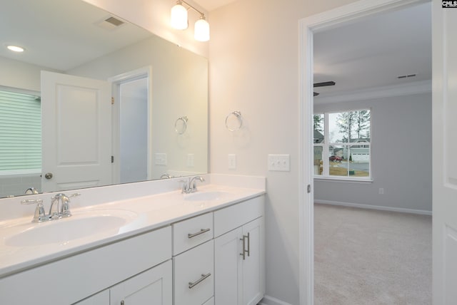 bathroom with vanity and ceiling fan