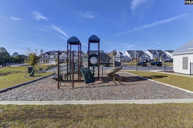 view of jungle gym with a lawn