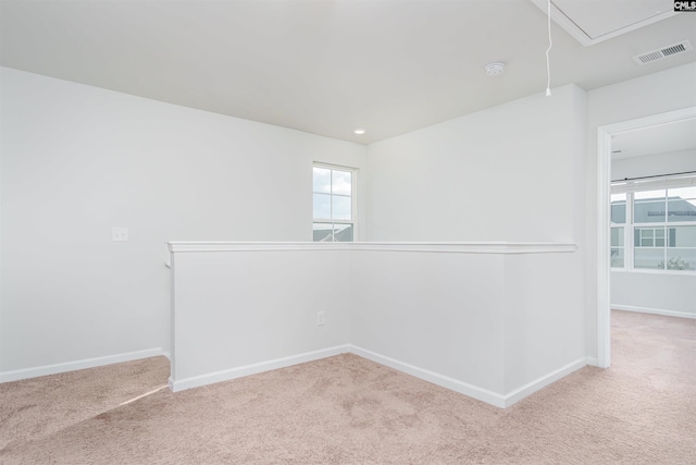 unfurnished room with carpet