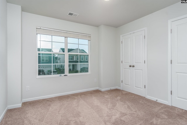 spare room with carpet flooring