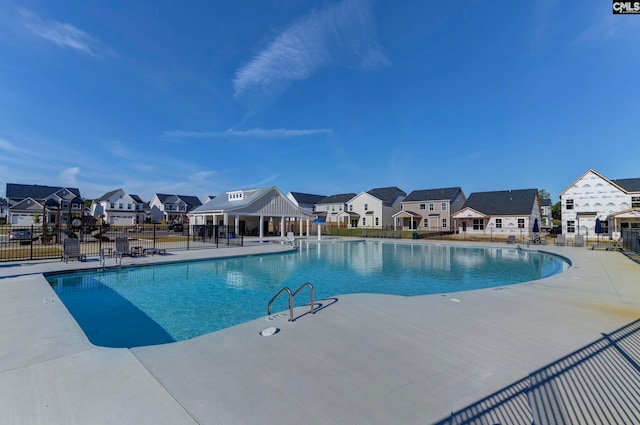 view of pool featuring a patio