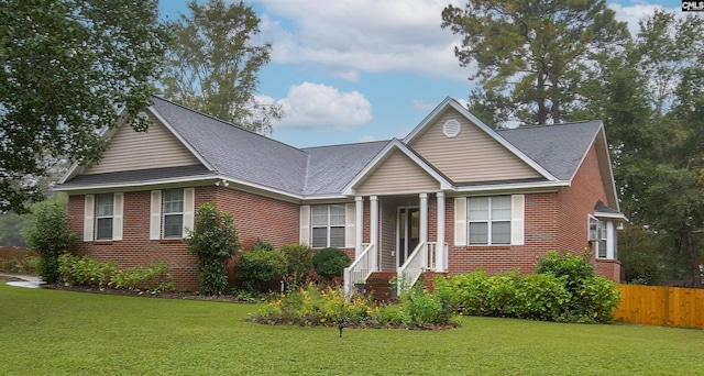 view of front of home with a front yard