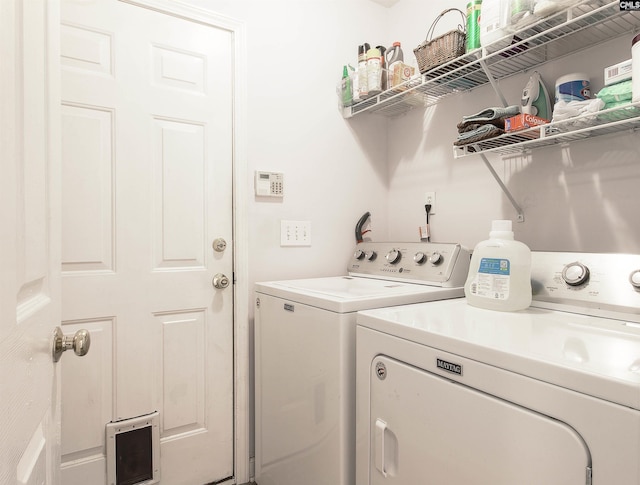 clothes washing area with independent washer and dryer