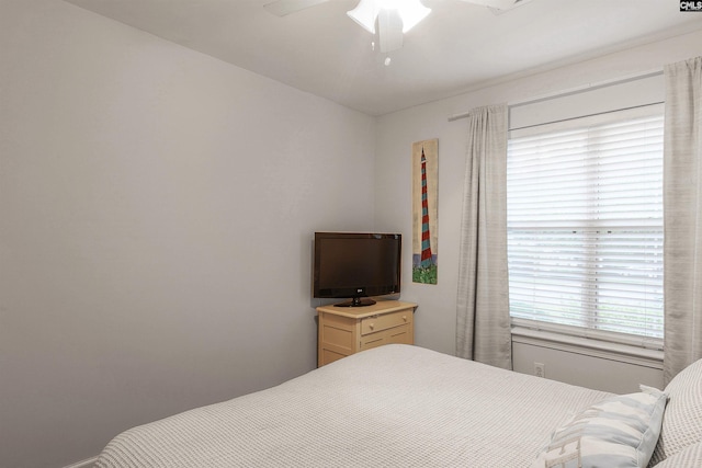 bedroom featuring ceiling fan