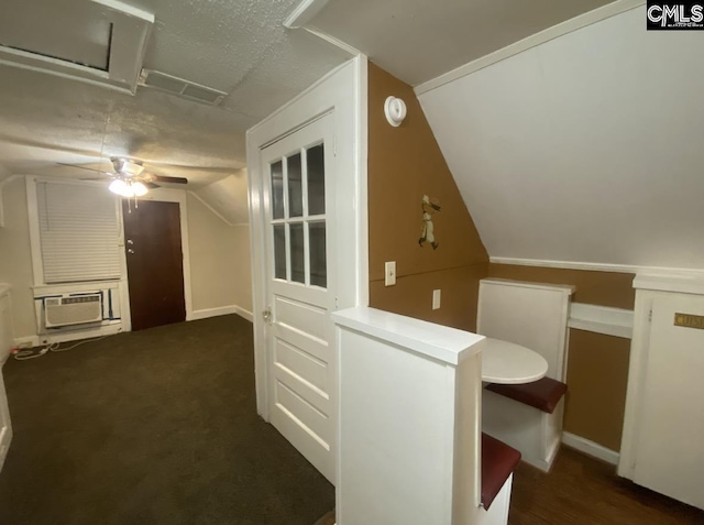 additional living space featuring carpet floors, ceiling fan, and vaulted ceiling