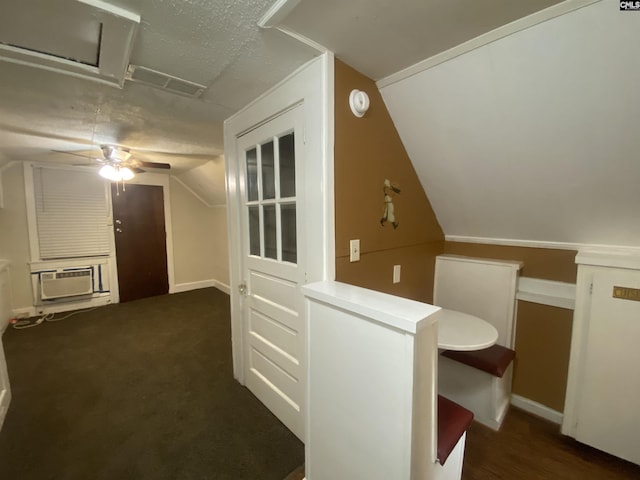 additional living space featuring a ceiling fan, vaulted ceiling, and carpet