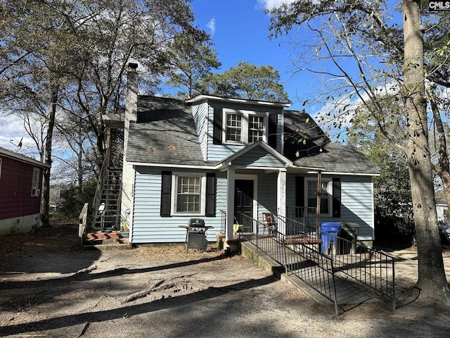 view of front of property featuring covered porch