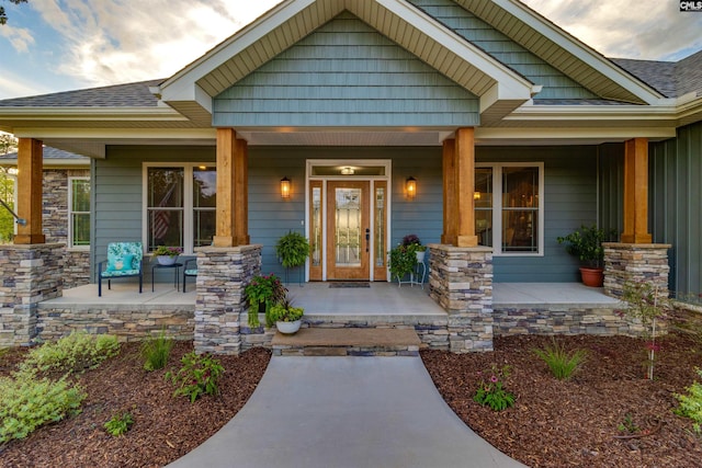 entrance to property with a porch