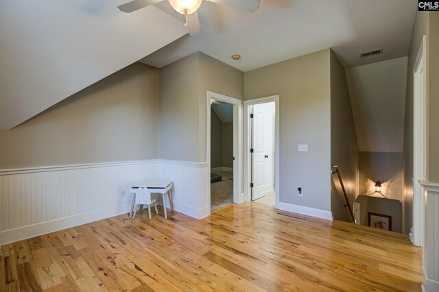 additional living space featuring ceiling fan and light hardwood / wood-style floors