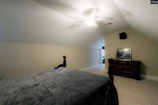 carpeted bedroom with lofted ceiling and ceiling fan