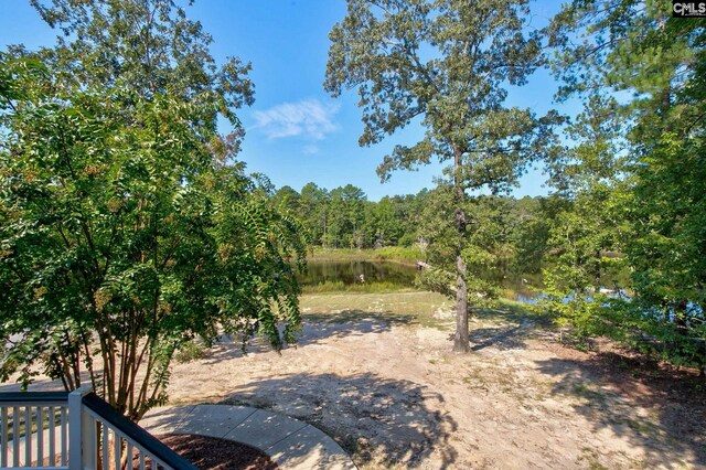 view of yard with a water view