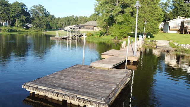 view of dock with a water view