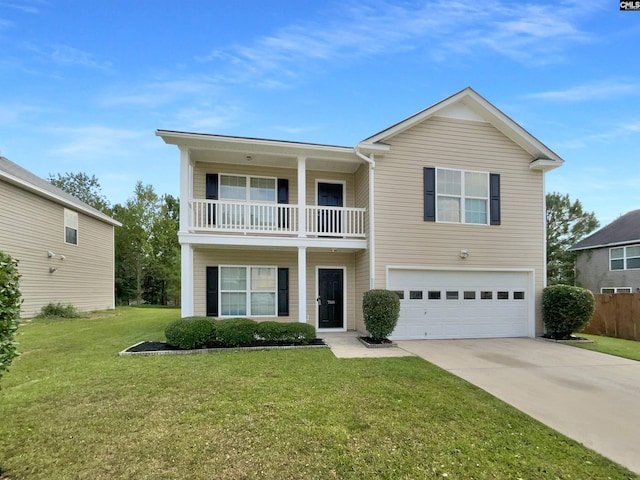 traditional-style home featuring a balcony, an attached garage, concrete driveway, and a front lawn