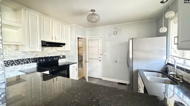 kitchen with black range with electric stovetop, decorative light fixtures, white cabinets, sink, and dark stone counters