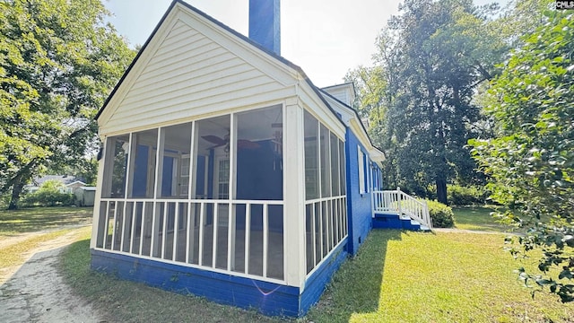 1926 Middleton St, Orangeburg, SC 29115 - view of side of property with a lawn, a sunroom, and a chimney