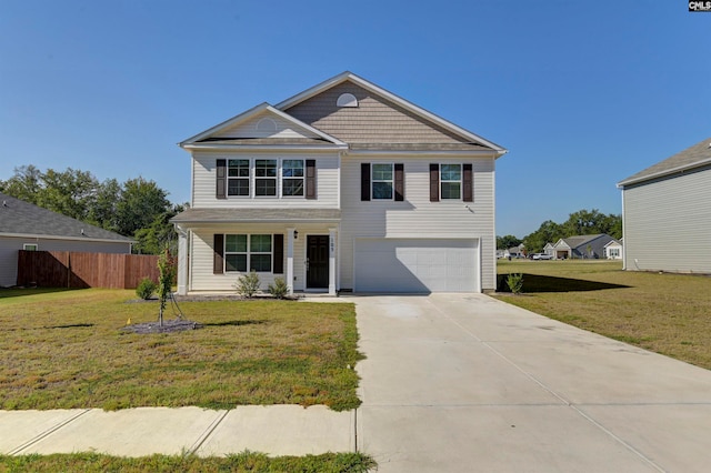 view of front facade featuring a garage and a front lawn