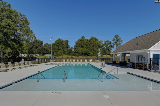 view of pool featuring a patio area