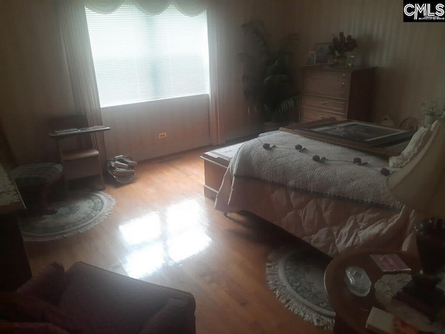 bedroom featuring light hardwood / wood-style flooring