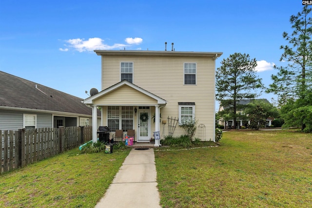 front of property featuring a front lawn