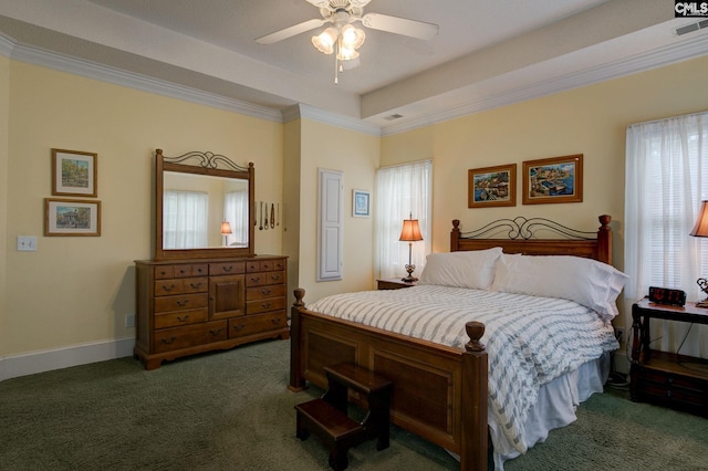 bedroom featuring dark carpet, multiple windows, ceiling fan, and crown molding