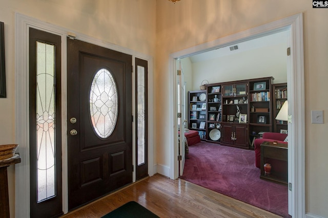 entrance foyer featuring wood-type flooring