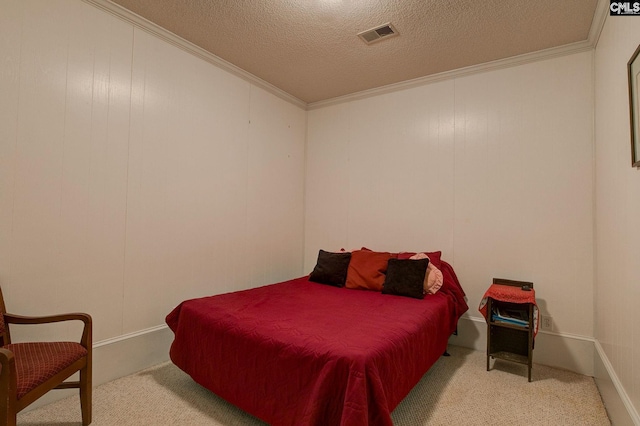 bedroom featuring a textured ceiling and light colored carpet