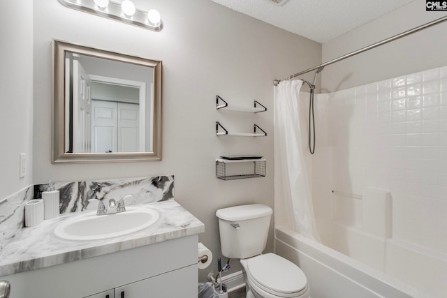 full bath featuring vanity, shower / bath combination with curtain, toilet, and a textured ceiling