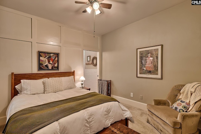 bedroom with ceiling fan and carpet floors