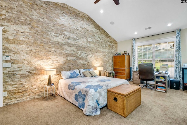 carpeted bedroom featuring ceiling fan and high vaulted ceiling