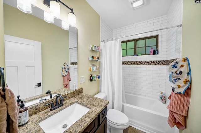 full bathroom featuring shower / bath combination with curtain, toilet, and vanity