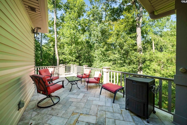 view of patio with a balcony