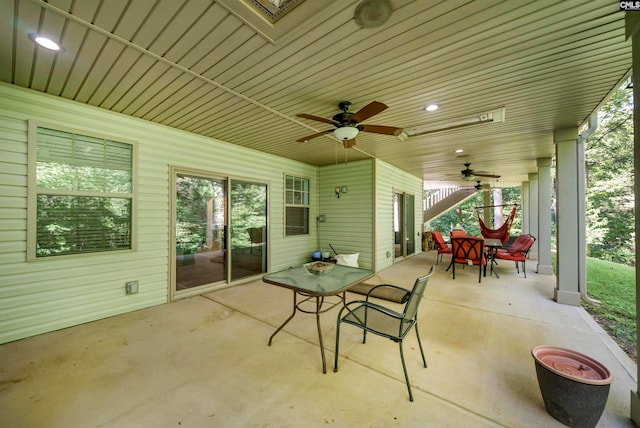 view of patio / terrace featuring ceiling fan