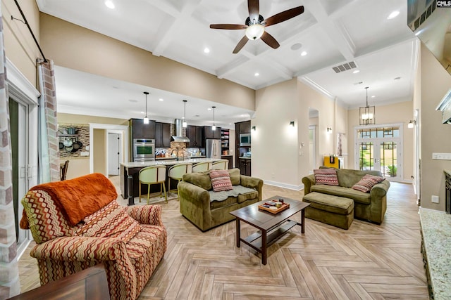 living room with light parquet floors, crown molding, ceiling fan, and coffered ceiling