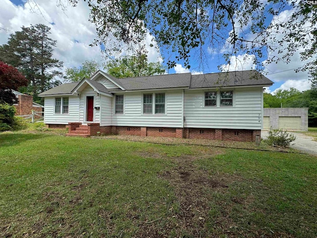 ranch-style house featuring a front lawn