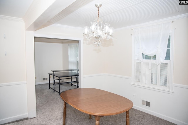 interior space with a notable chandelier and crown molding