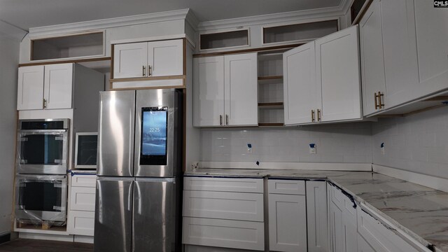 205 Miles Oak Ln, Blythewood, SC 29016 - kitchen featuring light stone counters, backsplash, crown molding, open shelves, and stainless steel appliances