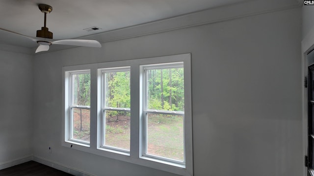 interior space featuring ceiling fan