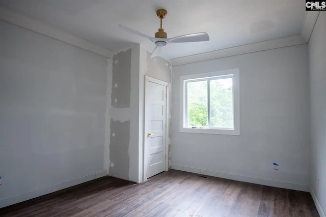 unfurnished bedroom with ceiling fan and hardwood / wood-style floors