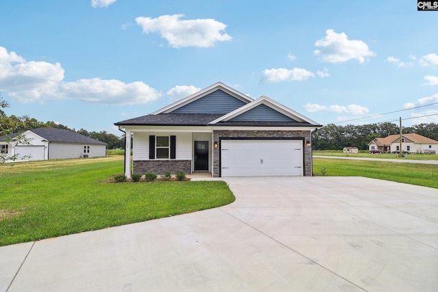 view of front of house with a front lawn and a garage