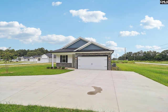 view of front of house featuring a front lawn and a garage