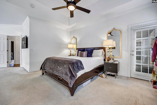 bedroom featuring ceiling fan, crown molding, and light colored carpet